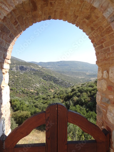 View through an arch near Megali Panagia photo