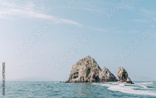 Small rock formation island, Islas Ballestas, Paracas, Peru photo