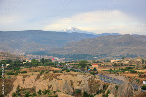 Distant view of Mount Erciyes, as seen from Göreme to the west. Cappadocia, Central Anatolia, Turkey. photo