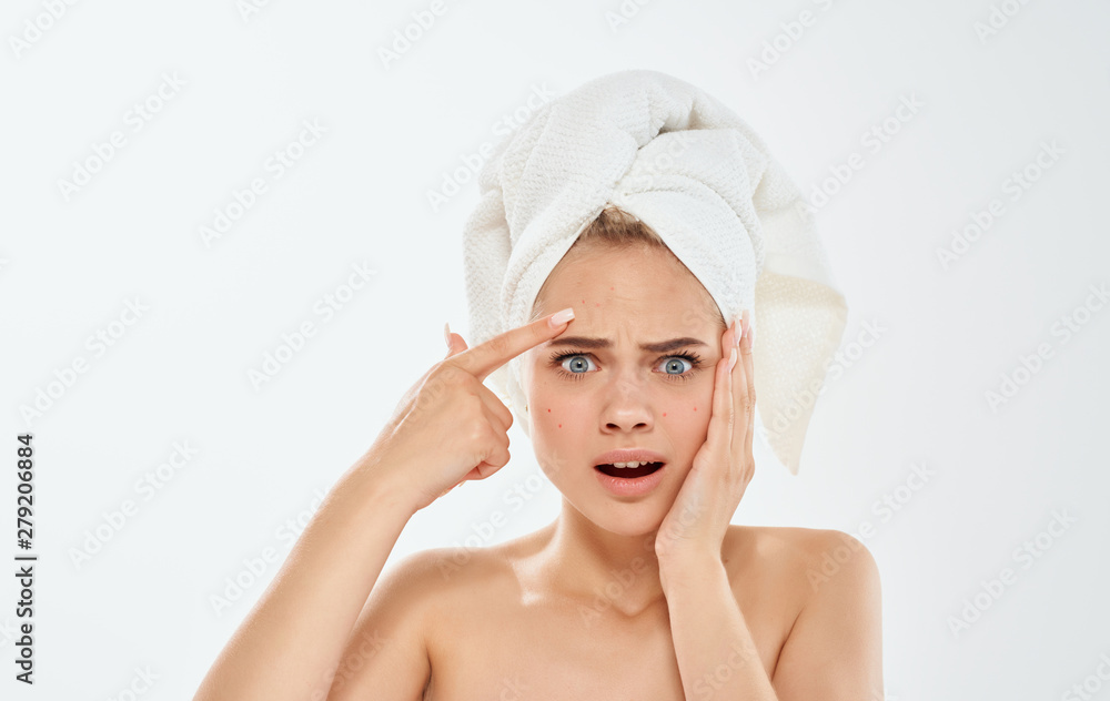 portrait of young woman with towel on her head portrait of young woman with towel on her head