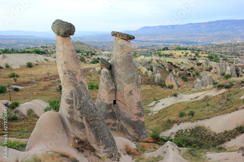 Three Graces (Three Beauties). Rock Formation near Ürgüp. Cappadocia, Central Anatolia, Turkey. photo