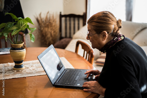  senior lady working with laptop