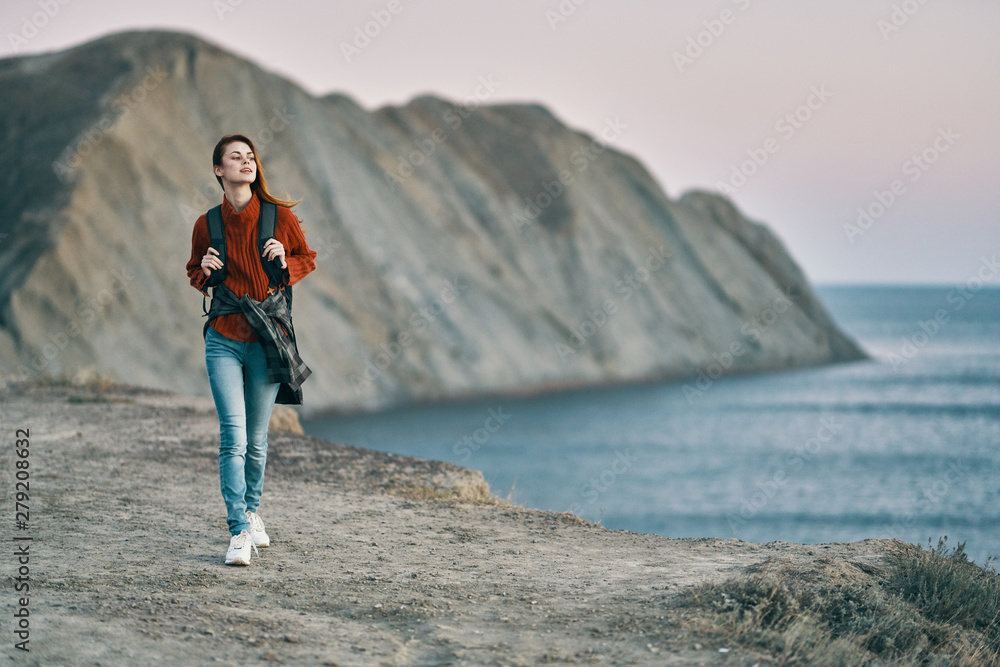 woman on top of mountain