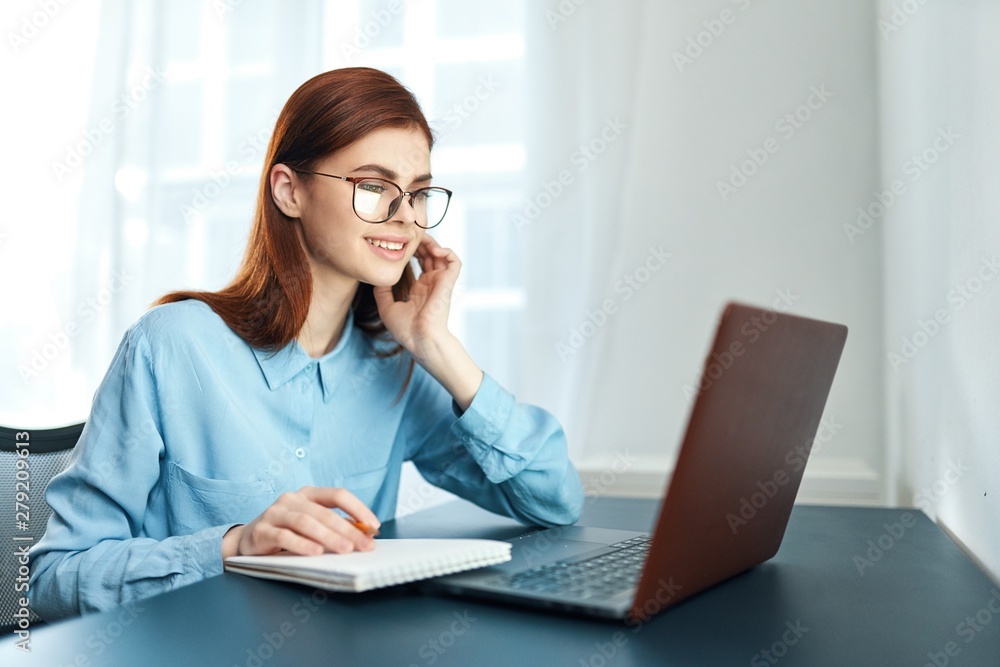 businesswoman working on laptop in office businesswoman working on laptop in office