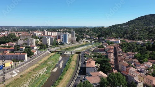 Alès river le Gardon, buildings bridge residential urban area France aerial shot 