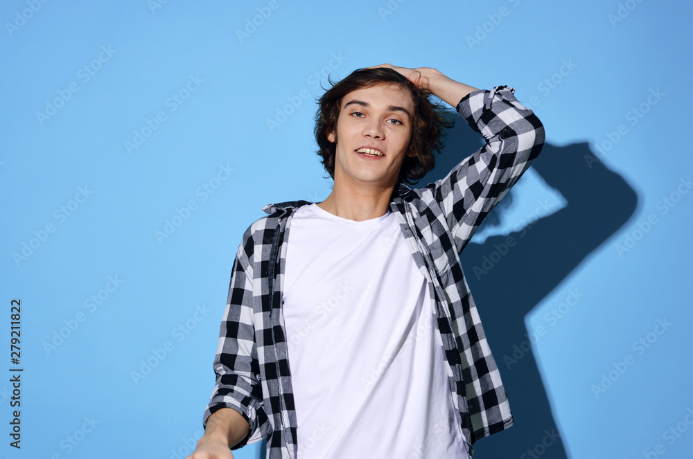 portrait of boy on a background of blue sky portrait of boy on a background of blue sky