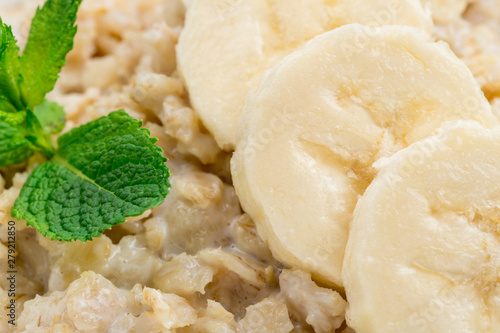 Oatmeal with banana and mint closeup