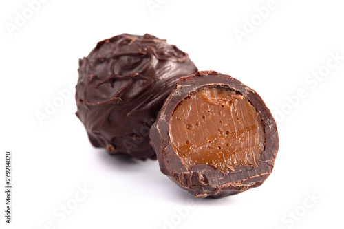 Dark Chocolate Truffles Filled with Caramel on a White Backgroun