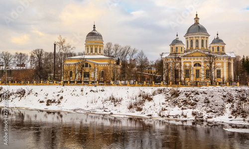 Ancient cathedrals on bank of river Tvertsa in ancient Russian city of Torzhok