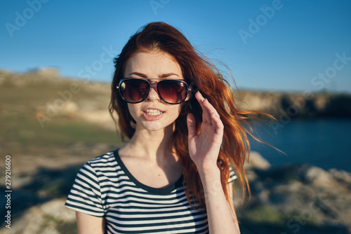 portrait of young woman in sunglasses