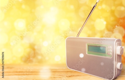 Old retro radio on background