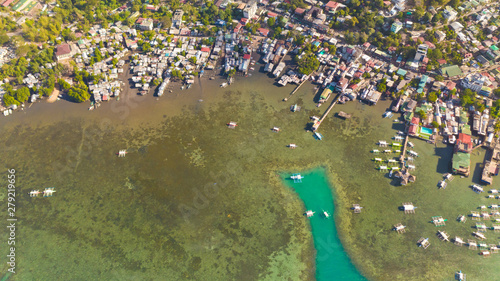 Sea bay in the city of Coron, Philippines. Coron Cityscapewith Sulu Sea. Palawan. Traditional banca boats parking in Coron harbor,