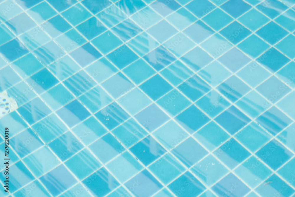 Tile surface, blue pool and reflection of blurred water. Tile surface, blue pool and reflection of blurred water.