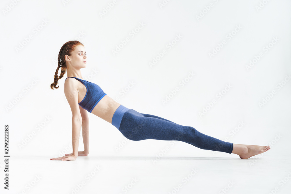 young woman doing fitness exercise young woman doing fitness exercise