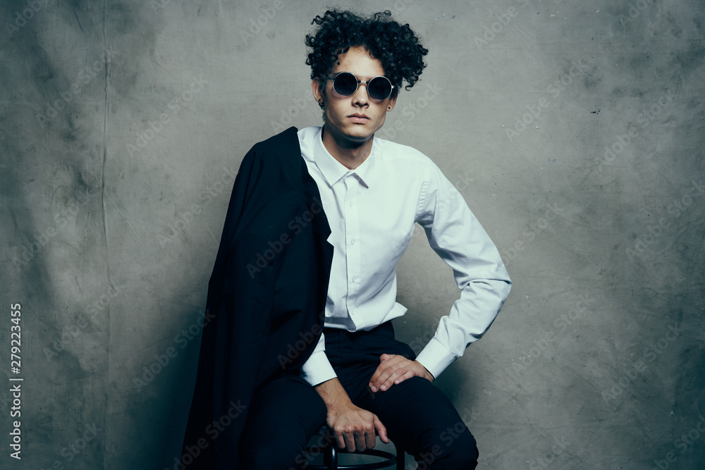 portrait of young man in sunglasses