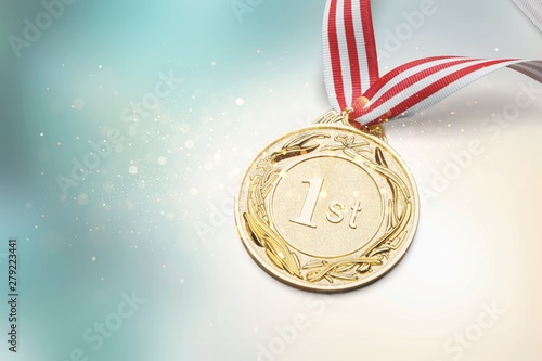 Hands holding golden trophy on a light background