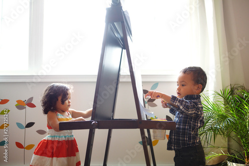 Vászonkép Children (18-23 months) playing at home