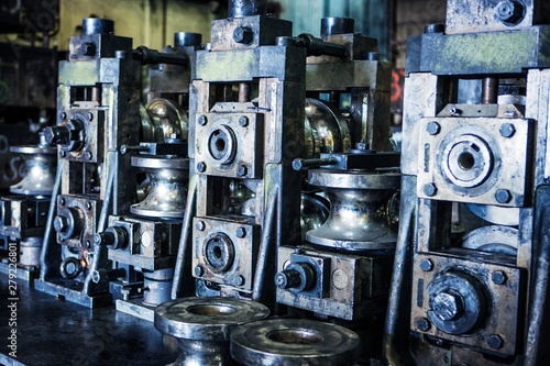Fotografija Metal machinery parts in warehouse