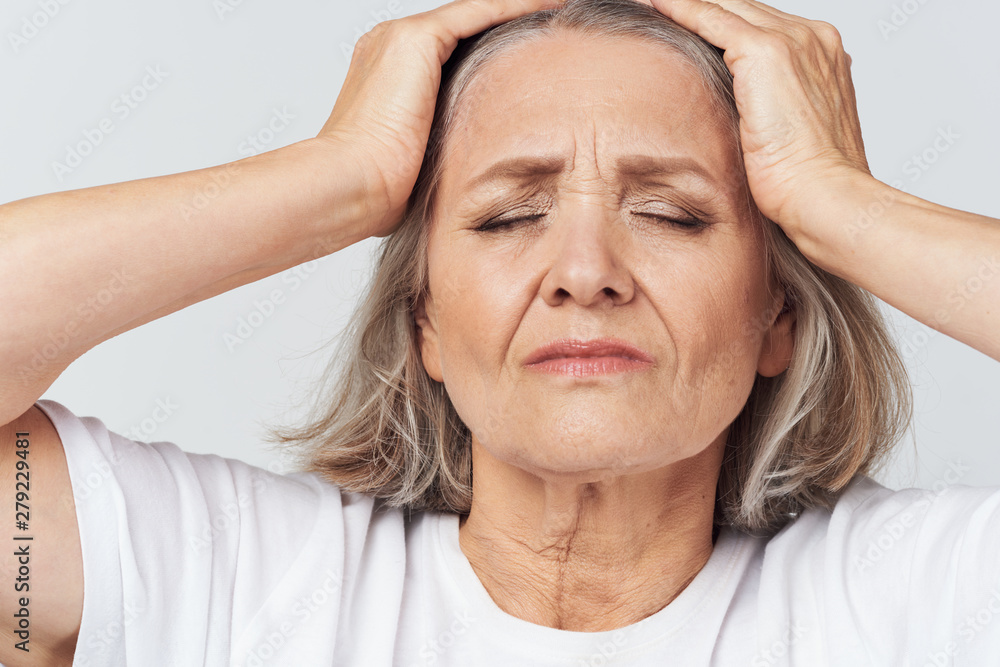 senior woman with headache senior woman with headache