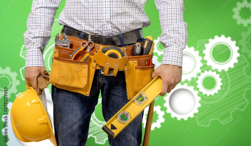 Worker with a tool belt. Isolated over background. Worker with a tool belt. Isolated over background.