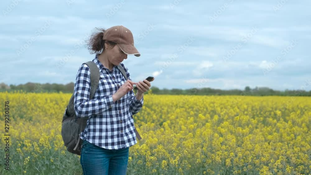 Lost phone signal. A woman in nature is trying to catch a phone signal on a smartphone. Lost phone signal. A woman in nature is trying to catch a phone signal on a smartphone.