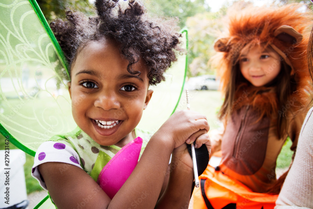 Obraz premium Children in fancy dress costumes on Halloween