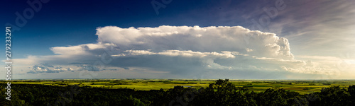 Thunderhead storm clouds building on the prairies of North Dakota photo