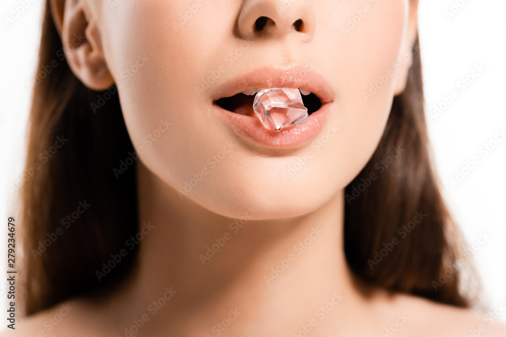 cropped view of young naked woman holding ice cube in mouth isolated on white cropped view of young naked woman holding ice cube in mouth isolated on white