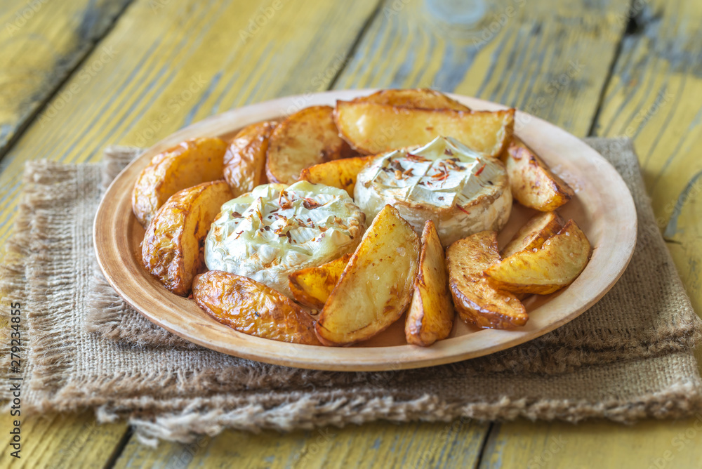 Baked Camembert cheese with potato Baked Camembert cheese with potato