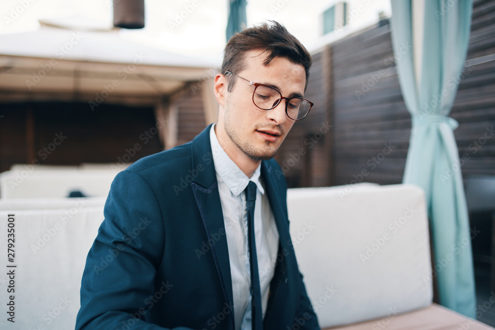 portrait of a young businessman portrait of a young businessman
