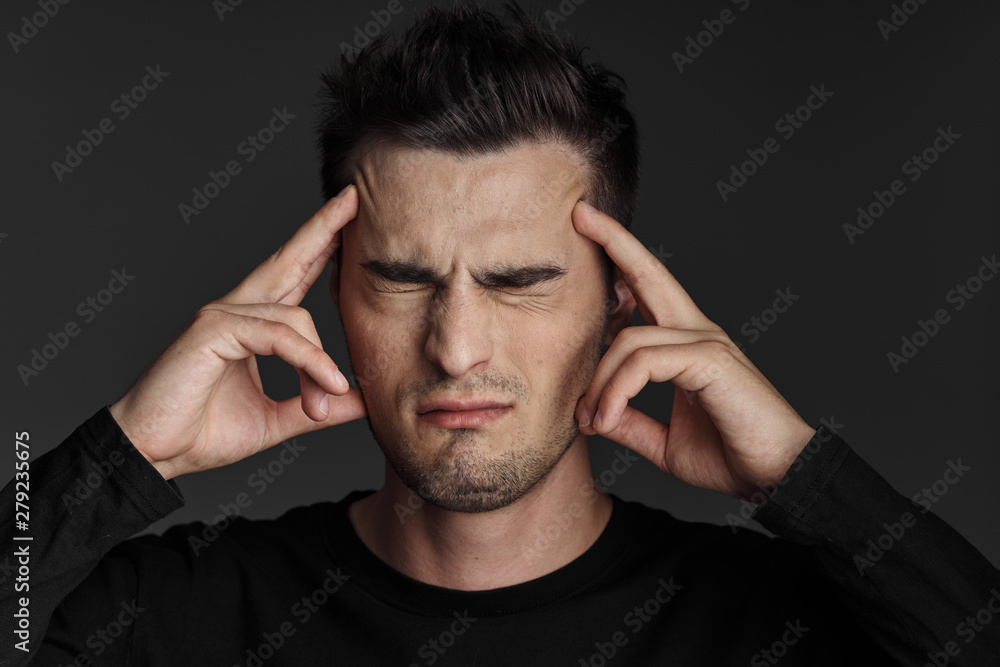 young man with headache young man with headache