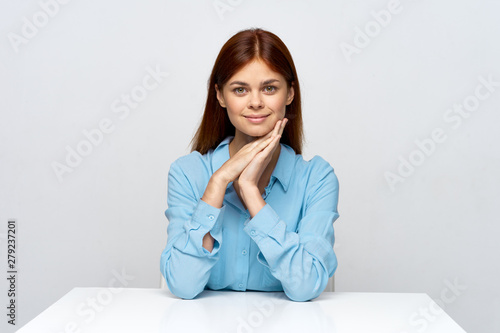 portrait of young woman sitting on sofa