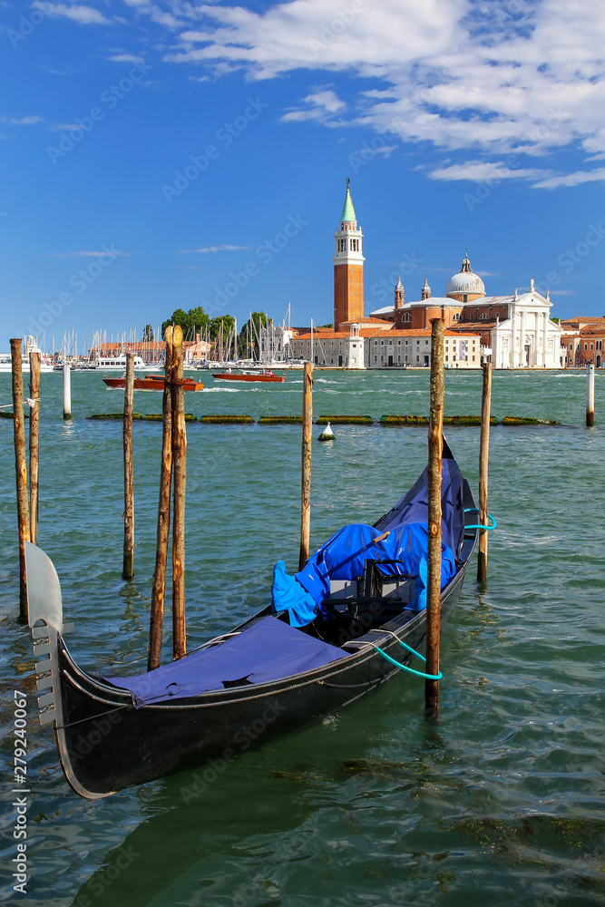 Gondola moored near San Marco square across from San Giorgio Maggiore island in Venice, Italy