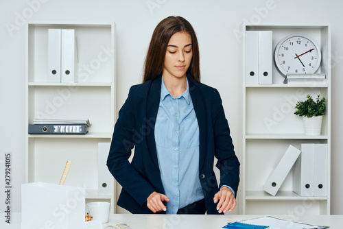 portrait of a young woman in an office © SHOTPRIME STUDIO