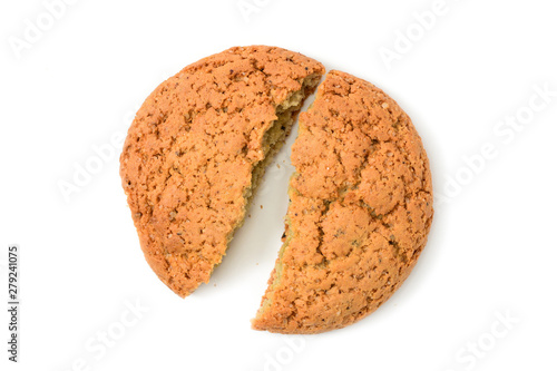 Homemade cookies. Broken sweet cookie made from oatmeal flour. Tasty biscuit in high resolution closeup, isolated on white background top view with shadows. Homemade bakery.