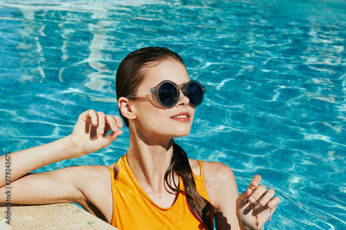 woman in black goggles in swimming pool
