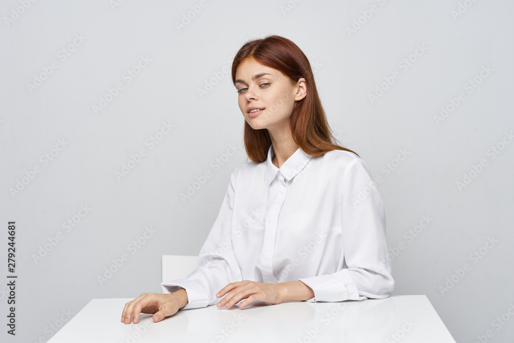 portrait of a young woman in office portrait of a young woman in office