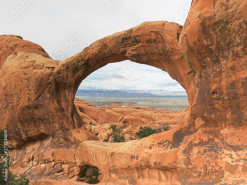 afternoon shot of double o arch in utah
