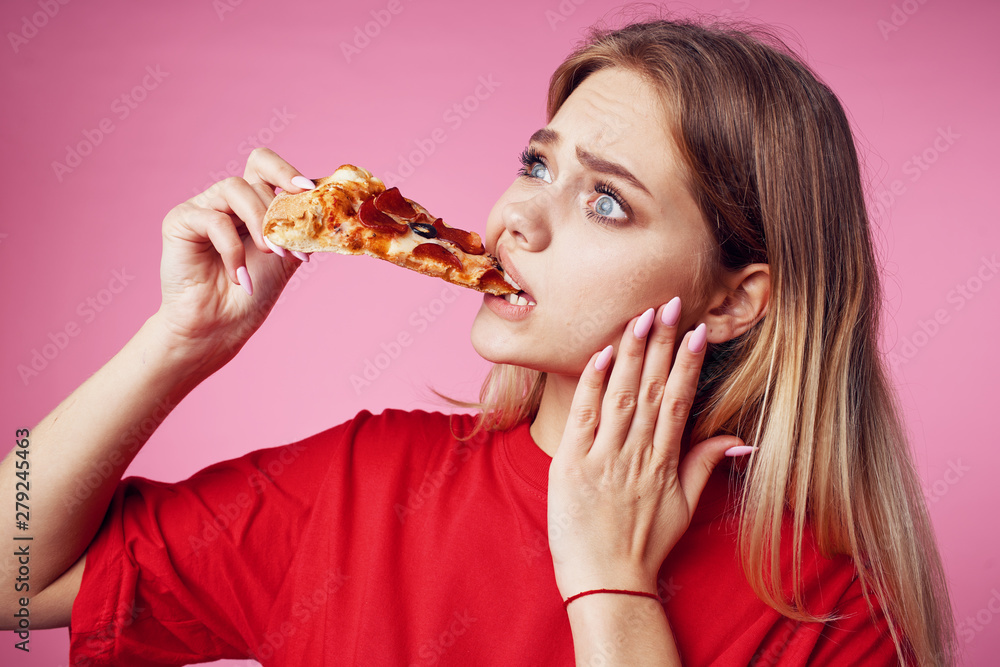 young woman eating pizza young woman eating pizza