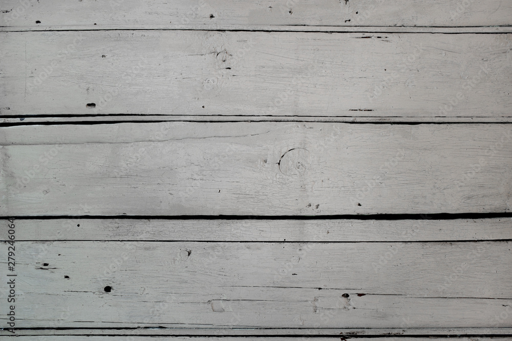 Fototapeta premium Old weathered wooden plank surface painted white. Background texture.