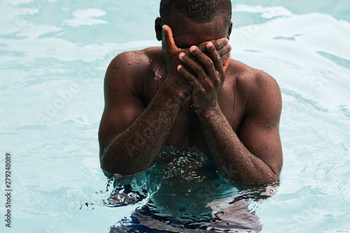 young man in swimming pool © SHOTPRIME STUDIO