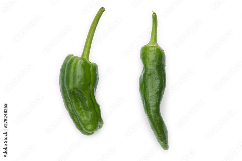two Padron peppers on white background, typical of Galician cuisine