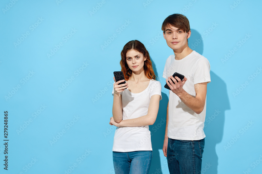 young couple with digital camera young couple with digital camera