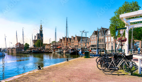 Harbor of Hoorn with the Hoofdtoren, sailboats and city buildings in Netherlands. photo