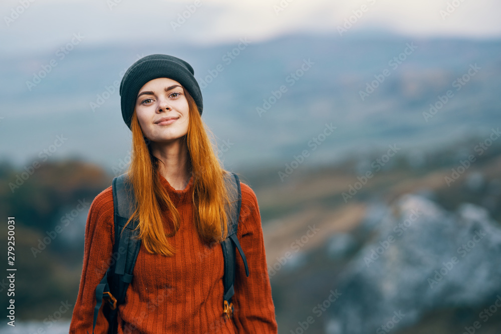 portrait of young woman on the background of blue sky