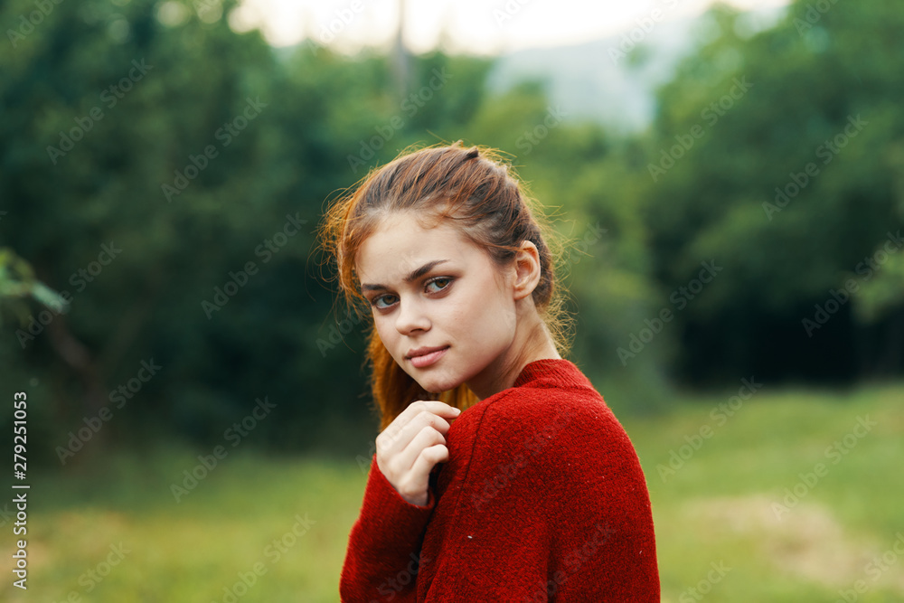portrait of young woman in park portrait of young woman in park