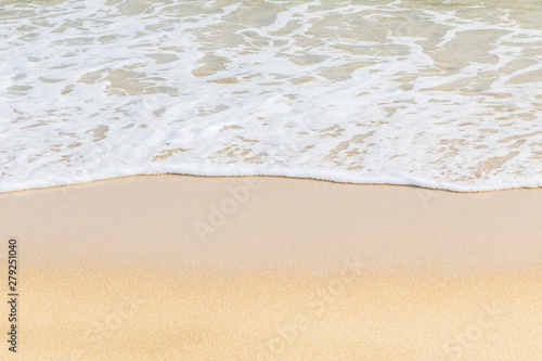 Soft wave of ocean on the sandy beach 