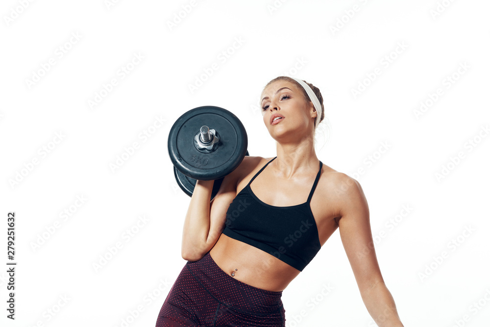 young woman lifting weights young woman lifting weights