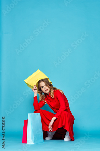 young woman with shopping bags