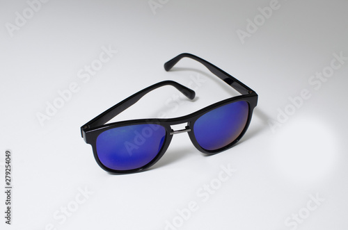 Blue eyeglasses with black rim on white background
